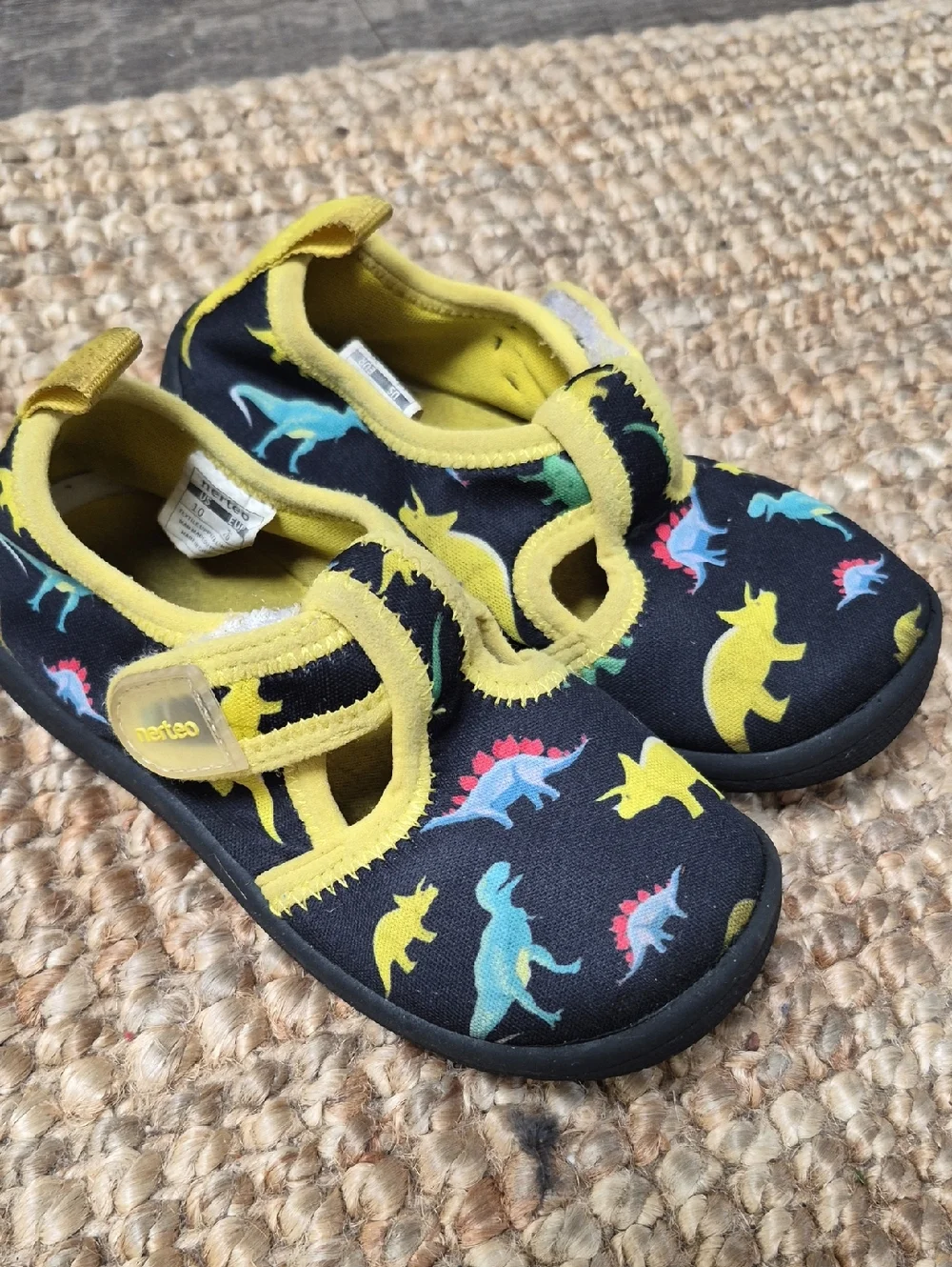 Toddler's dinosaur print water shoes are from the brand Nerteo. 10 Water Shoes